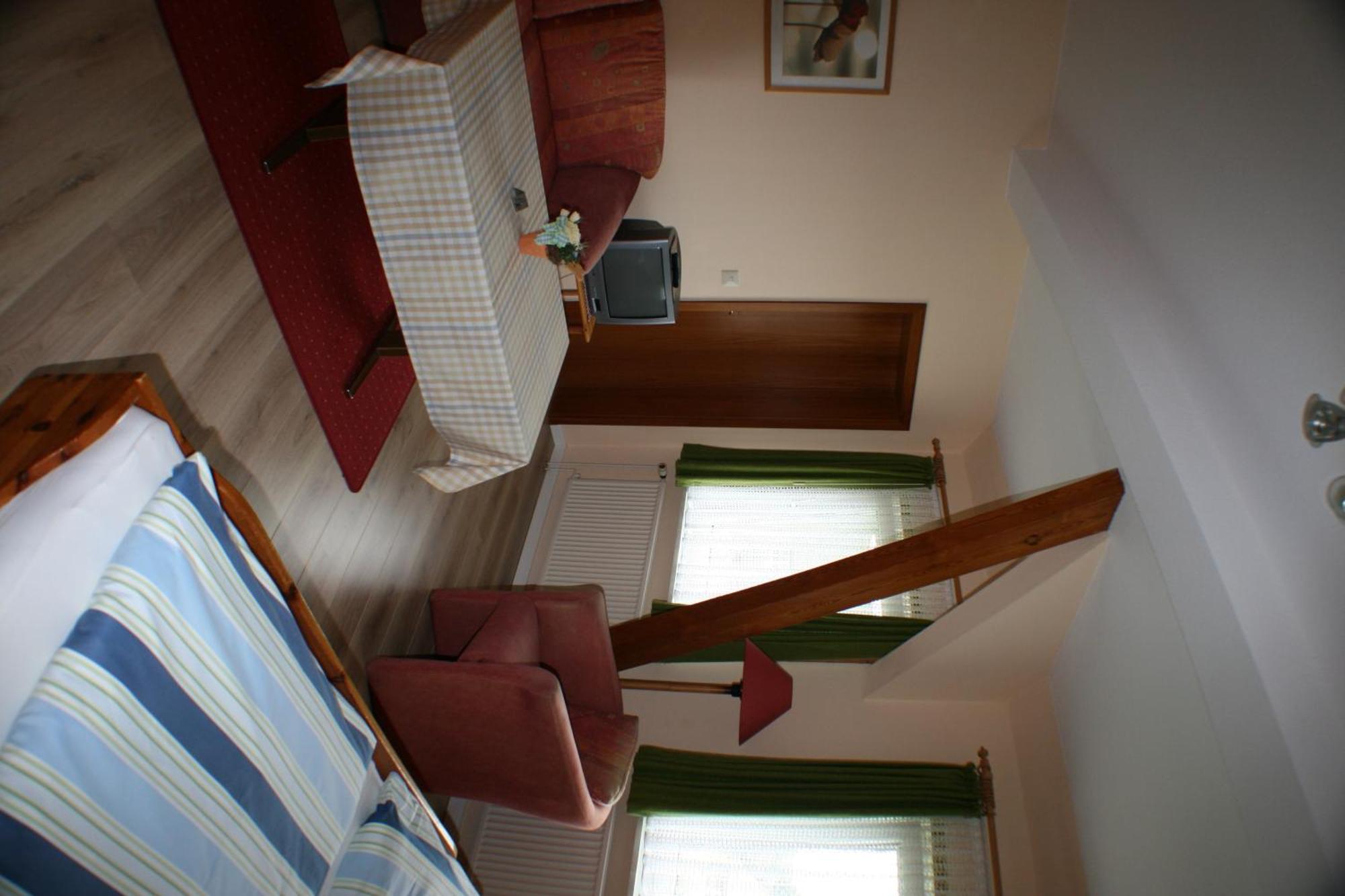 Hotel Garni Zur Post Utersum Номер фото